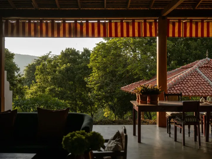 The open sided lounge looking out over the garden at Peacock Hill Sigiriya