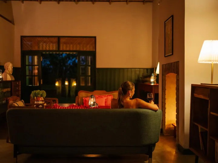 Lamplight in the lounge at dusk at Peacock Hill Sigiriya