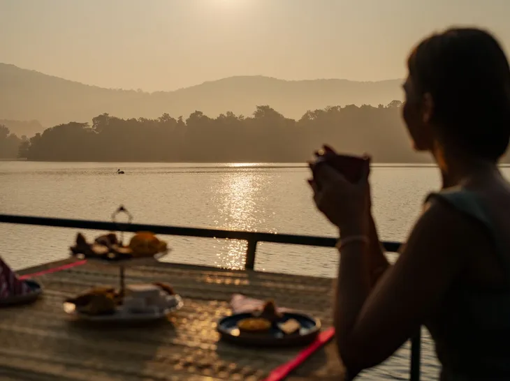Afternoon tea served on a boat on Wewela Lake at Peacock Hill Sigiriya
