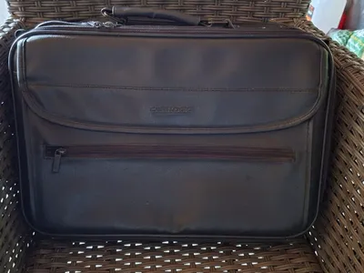 Items for sale
– Black leather multi compartment lap top bag 8.00