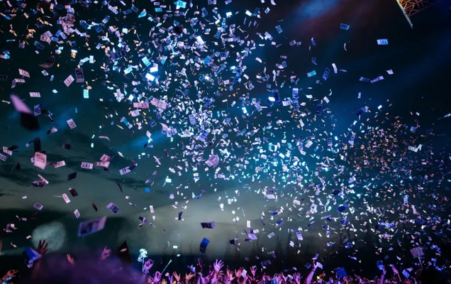 Confetti cascading down during a rock concert