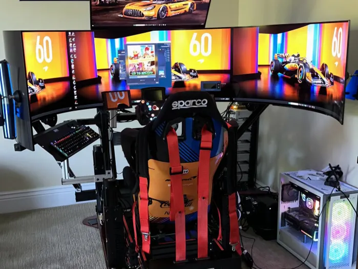 Racing sim rig with a multiple screen layout