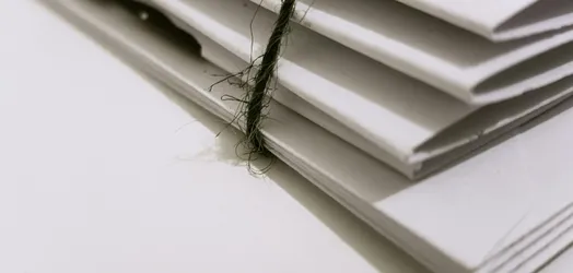 White Paper Folders With Black Tie