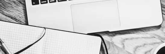 Computer, notebook, coffee