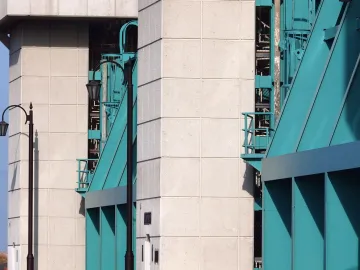 Steel painted blue green on factory exterior