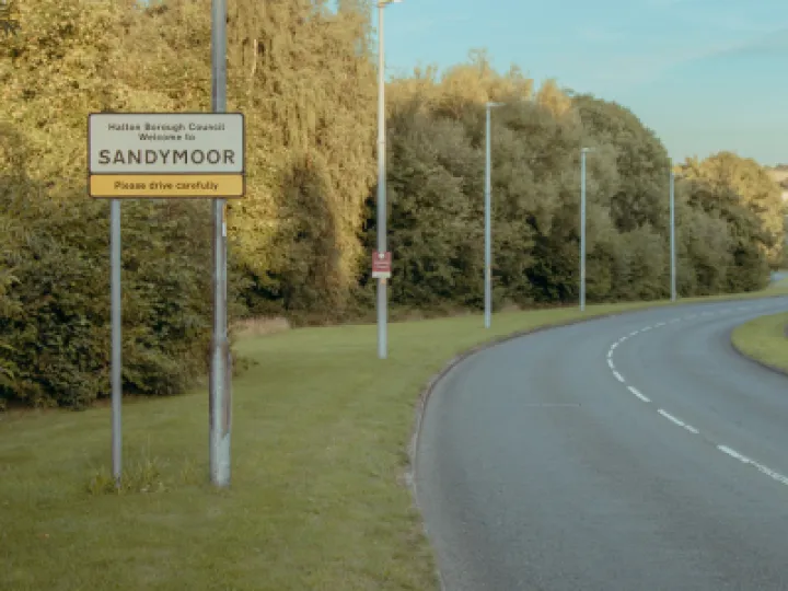 Sign by Road