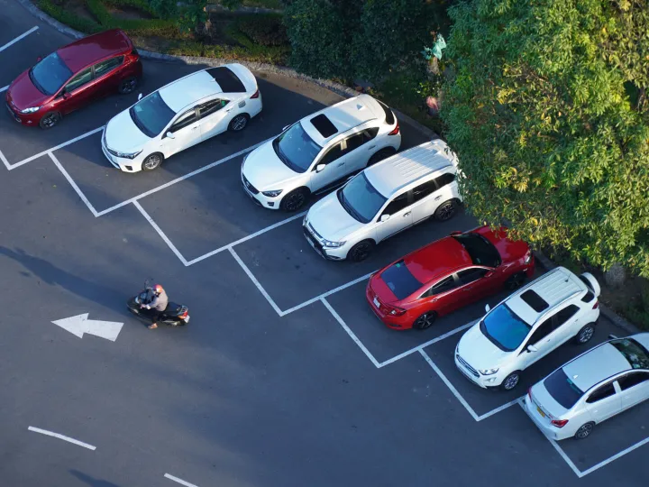 Overhead view of car park with painted bays